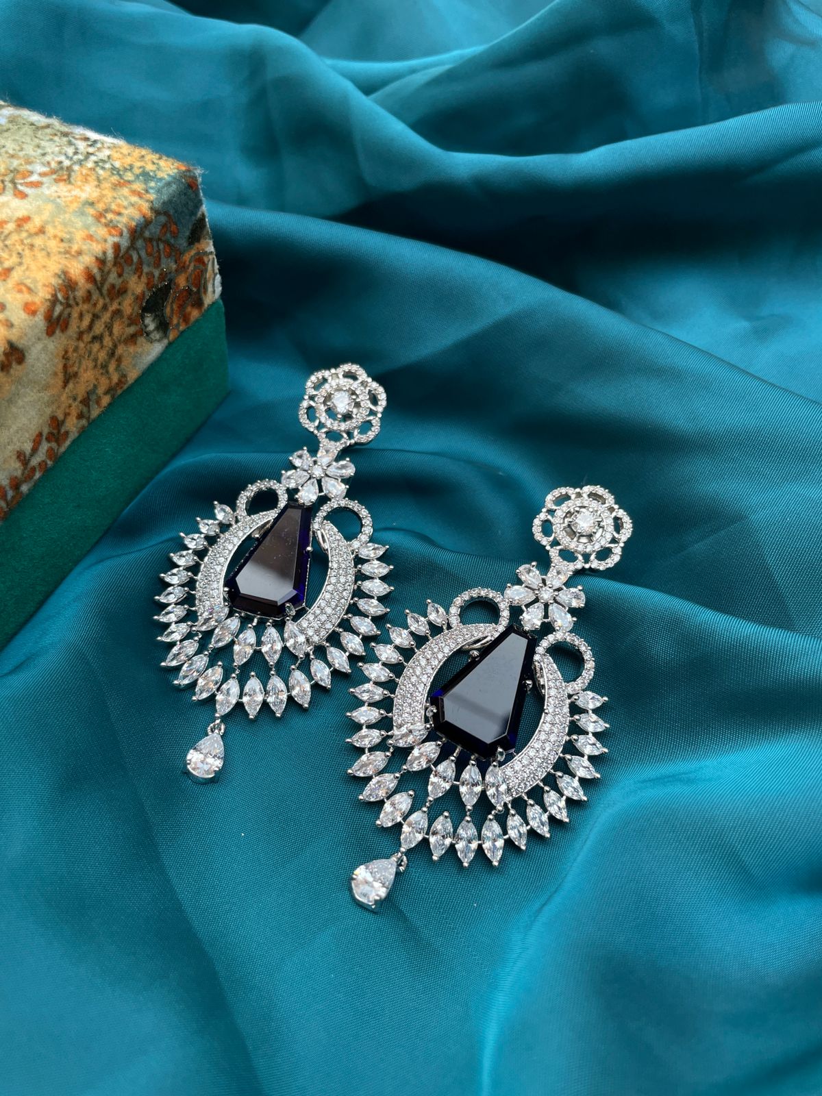 Glittering Petals Diamond Stud Earrings |Floral Designs | CaratLane